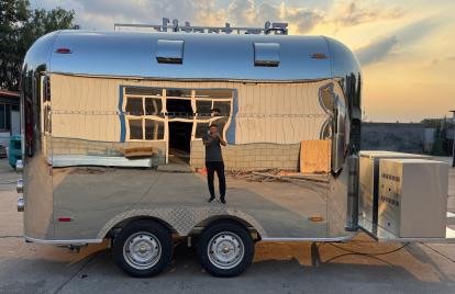 Polished stainless trailer, side view