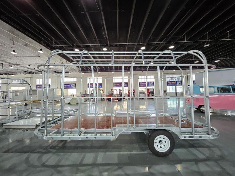 Welded steel trailer frame during production